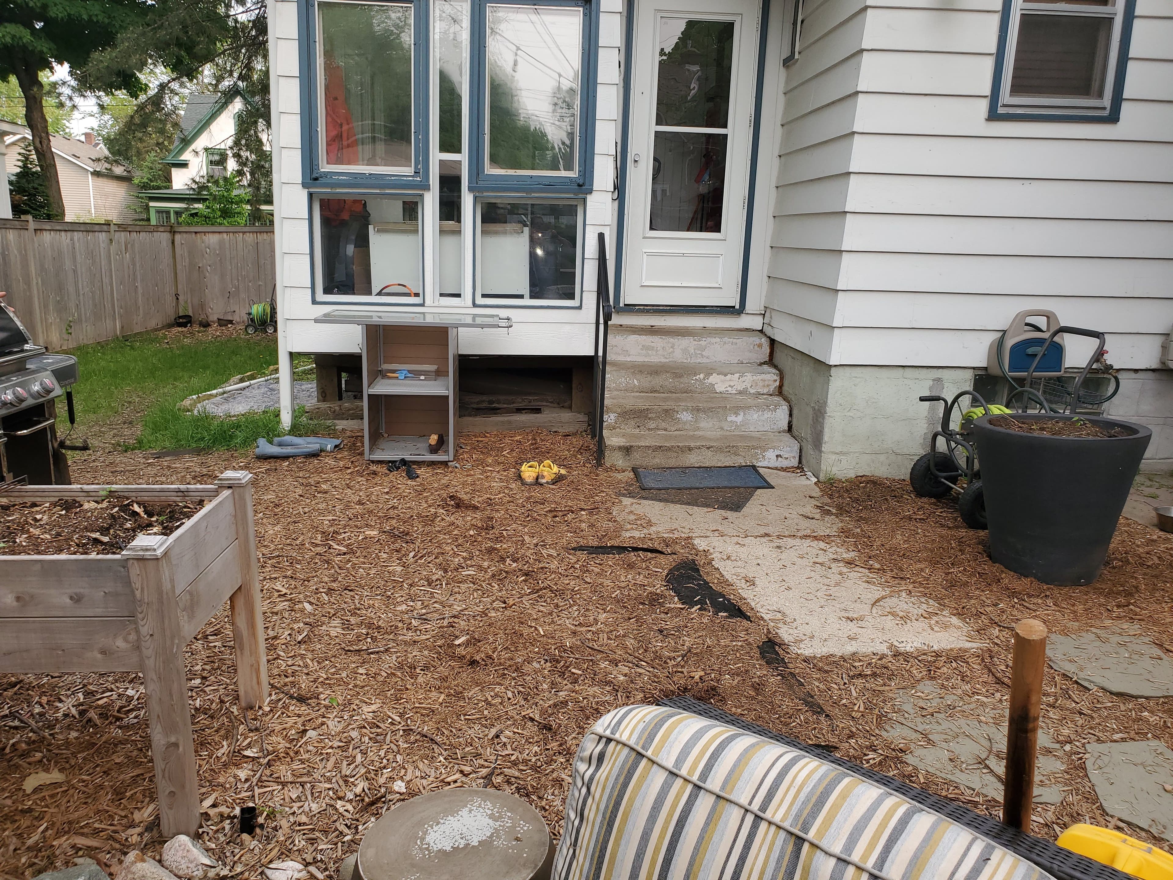 Project Raising the Porch with Helical Piers for Stability in Minneapolis image