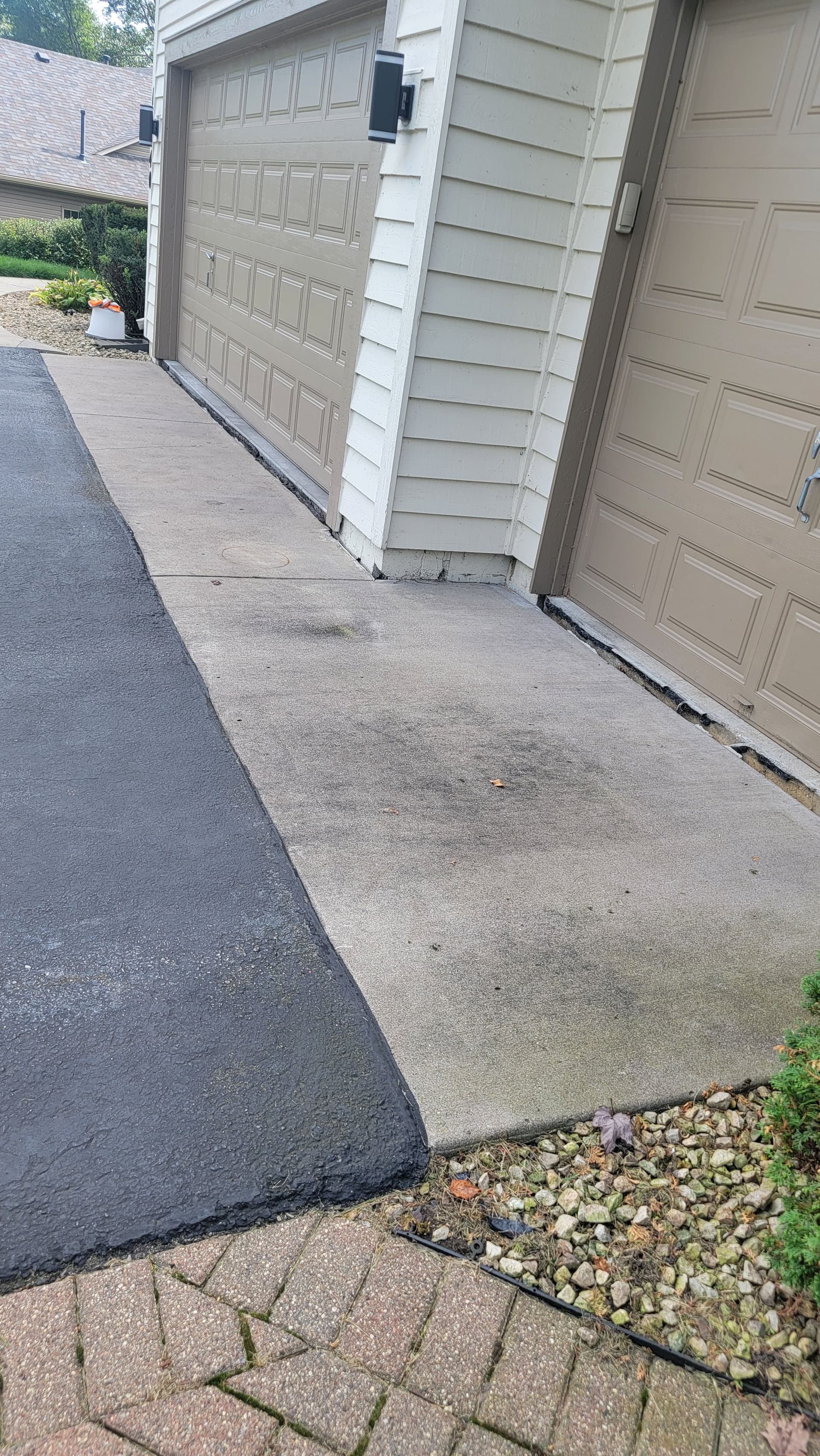 Sunken Driveway Slabs & Voids: How Mudjacking Fixes It image