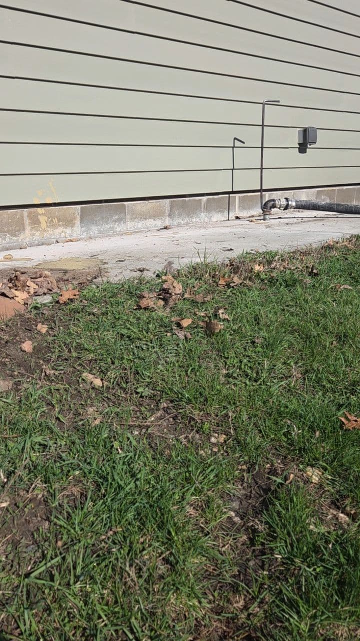 Side Patio Concrete Lifting Fixes Drainage Problem in Northfield MN image