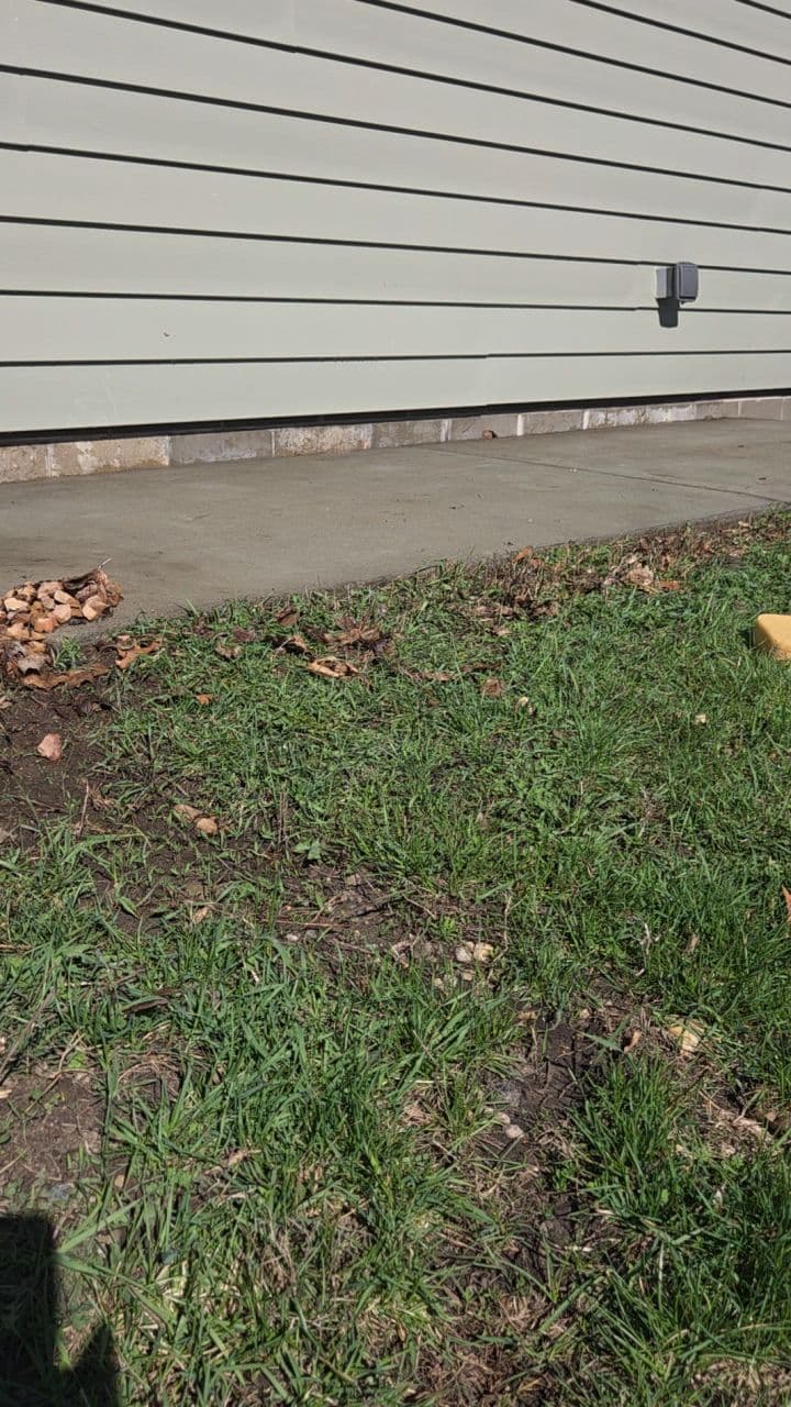 Gallery photos for Side Patio Concrete Lifting Fixes Drainage Problem in Northfield MN: Image #1