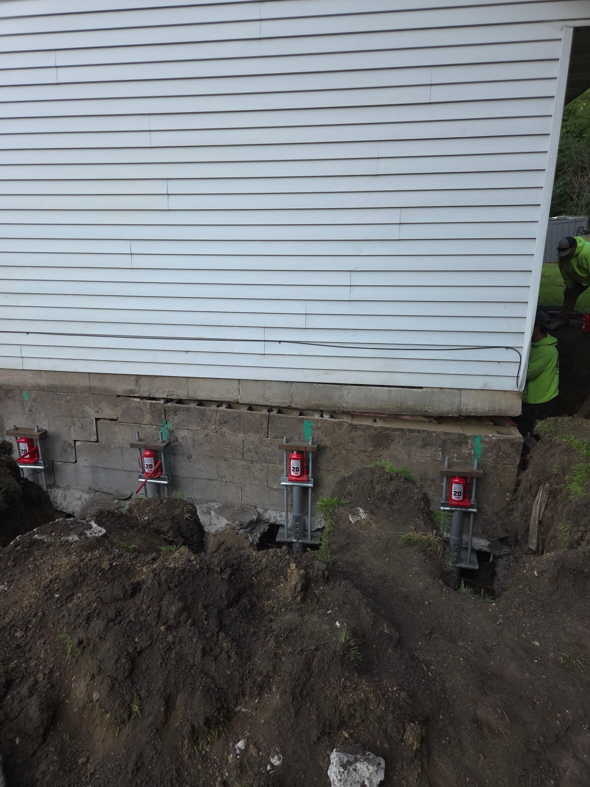 Foundation Releveling and Helical Pier Installation in Waterville image