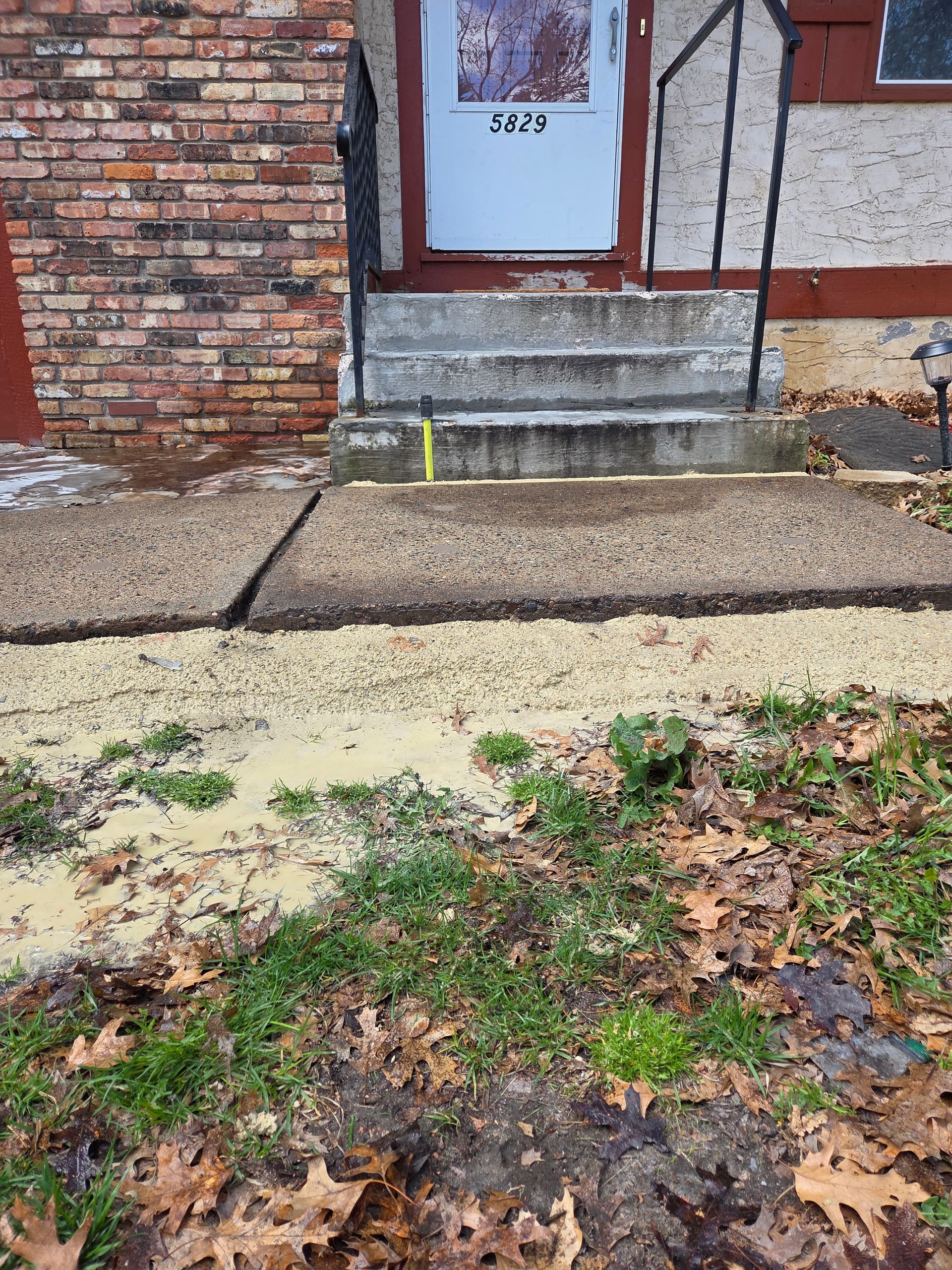 Gallery photos for Sunken Front Entry Raised Back to Level with Mudjacking: Image #1