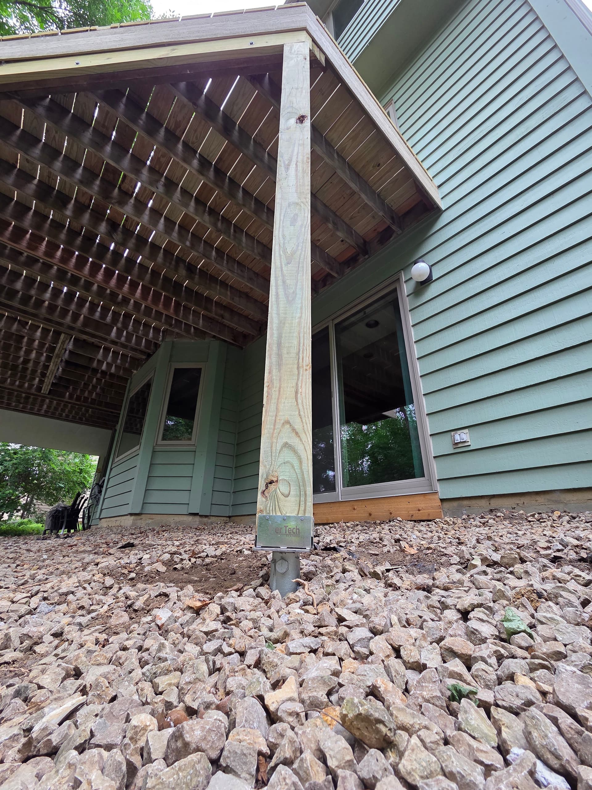 Sinking Deck Footings Fixed with Helical Piers in Lakeville image