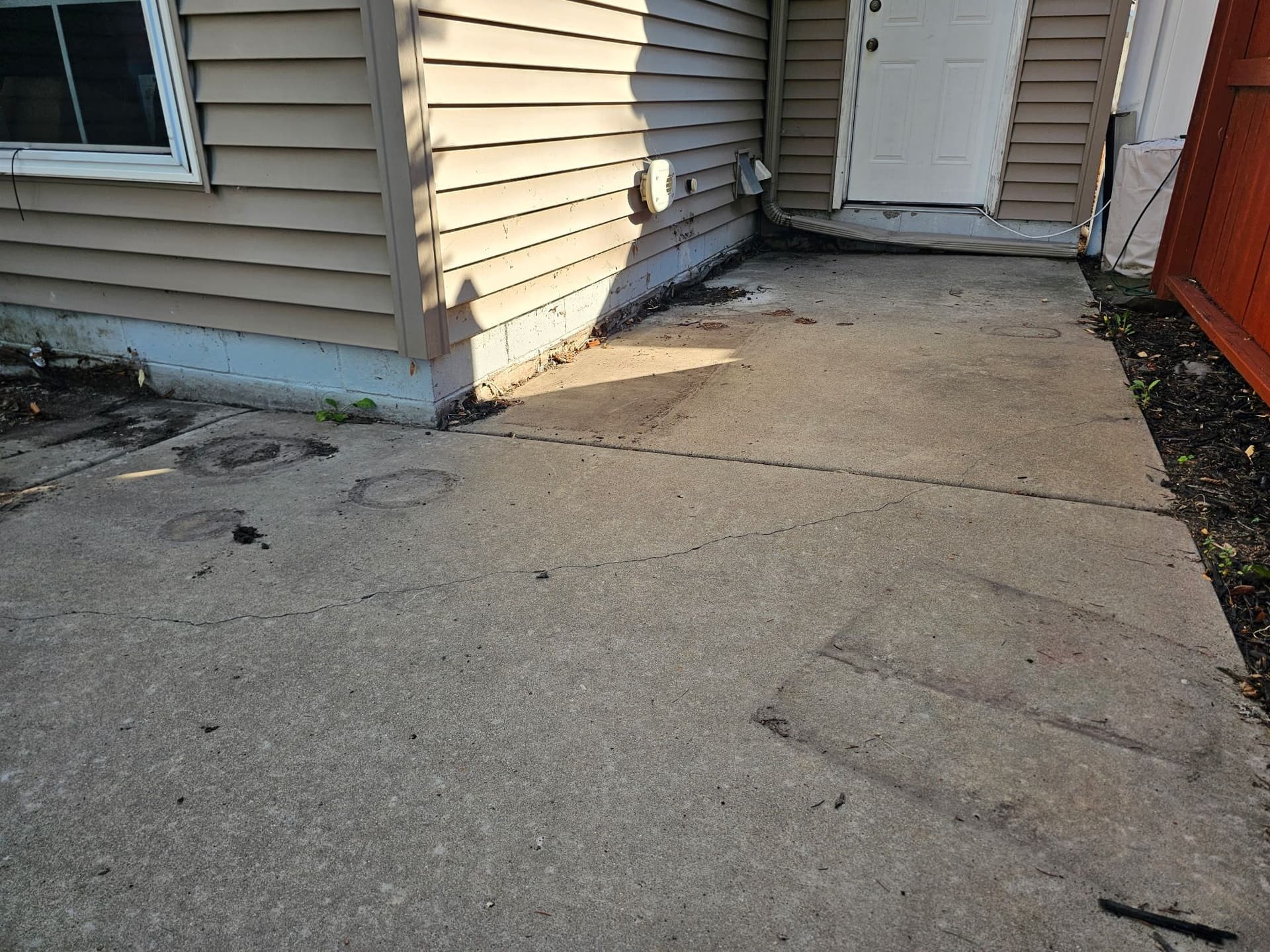 Gallery photos for Back Patio Mudjacking in Elko New Market Fixes Drainage Problem: Image #2
