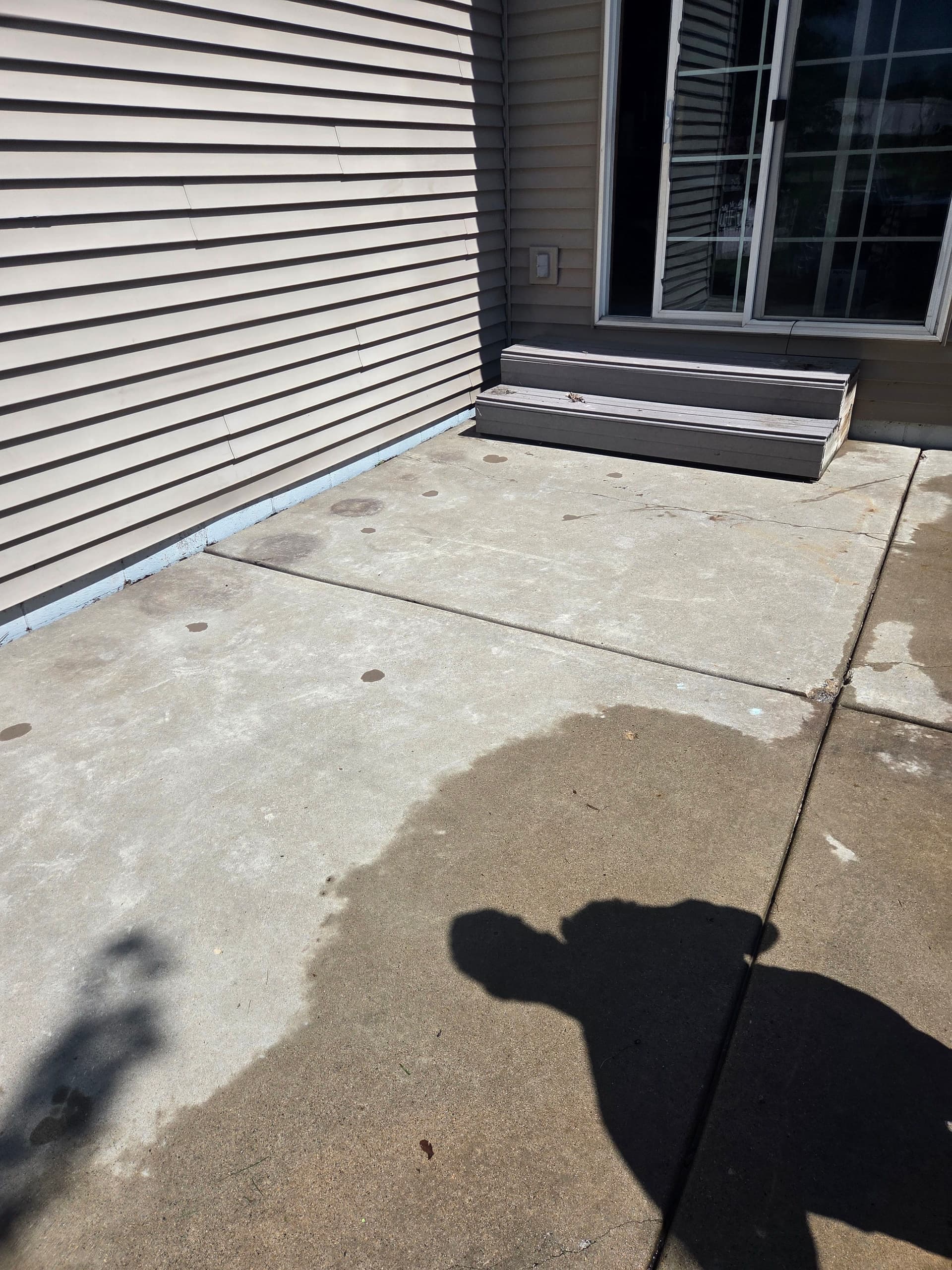 Gallery photos for Back Patio Mudjacking in Elko New Market Fixes Drainage Problem: Image #1