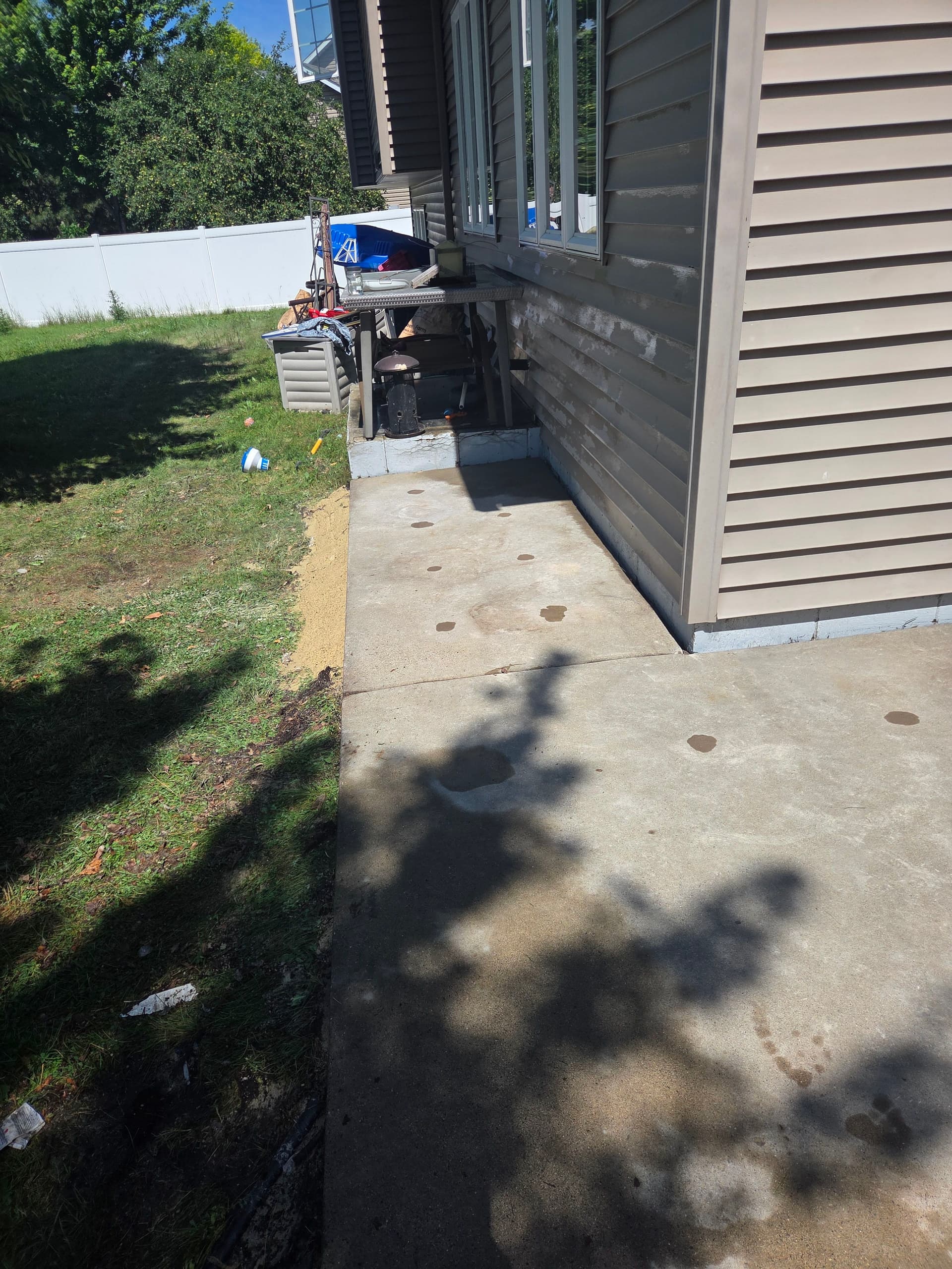Gallery photos for Back Patio Mudjacking in Elko New Market Fixes Drainage Problem: Image #5